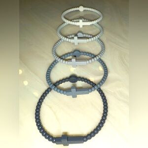 PERFECT CONDITION wore twice! 5 Rubber Cross bracelets!